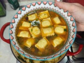 ravioli soup served in bowl