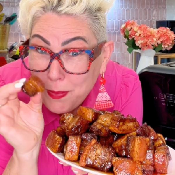 Pork Belly Burnt Ends cooked Pork Belly Burnt Ends cooked holding piece