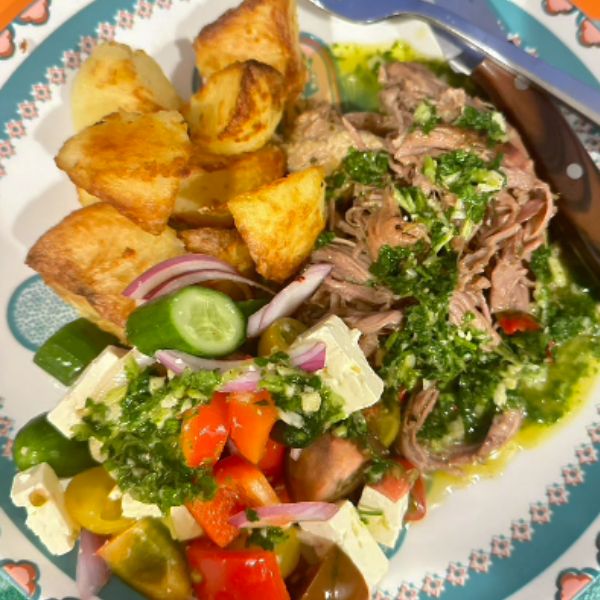 Roast Lamb with Chimichurri Sauce Roast Lamb with Chimichurri Sauce served on plate