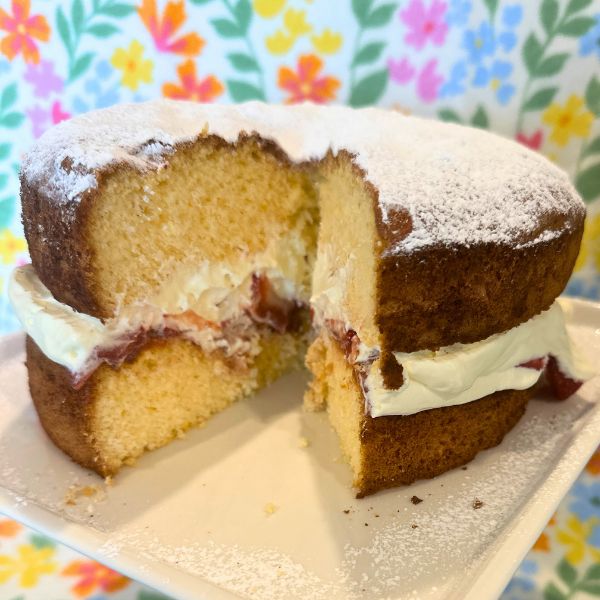 Victoria Cake plated Victoria Cake on cake stand