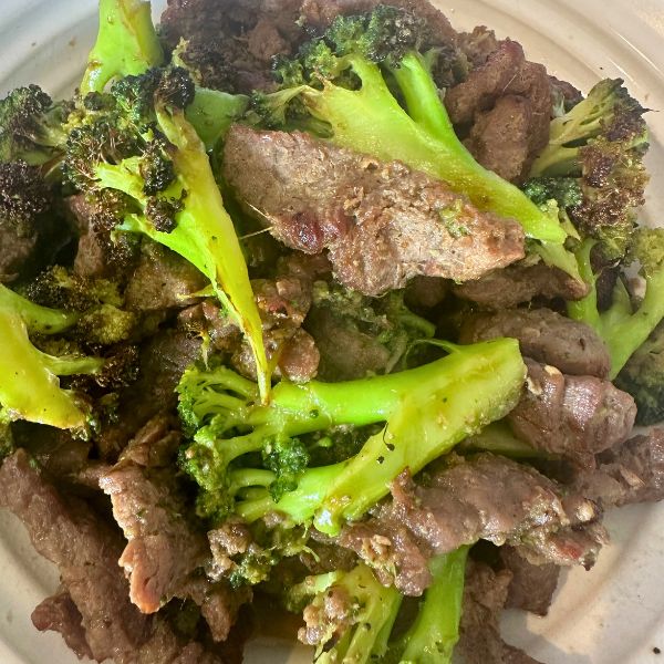Air Fryer Beef and Broccoli cooked Air Fryer Beef and Broccoli cooked and served