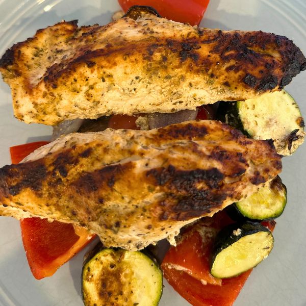 Air fryer Greek Chicken and Vegetables cooked Air fryer Greek Chicken and Vegetables cooked