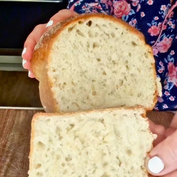 Homemade Bread sliced and holding