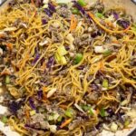 Beef chow mein cooked in pan