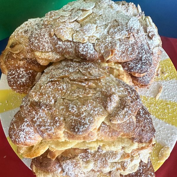 Almond Croissant icing sugar Almond Croissant dusted with icing sugar