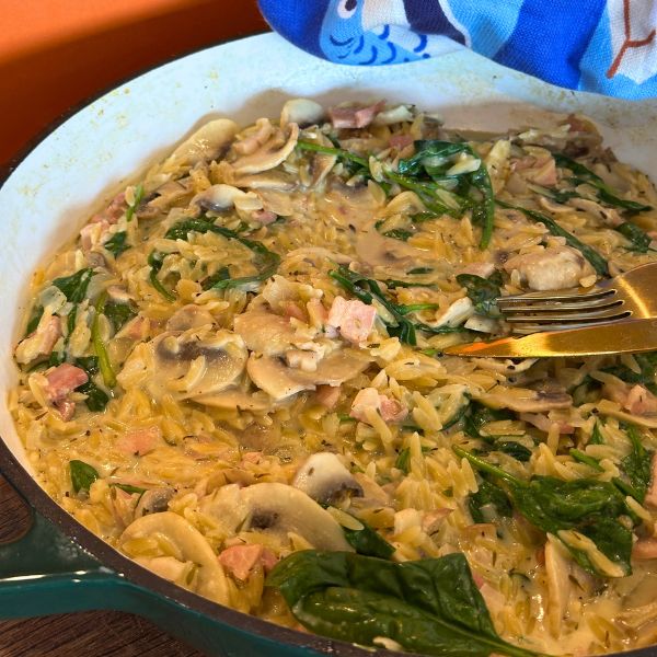 Creamy Mushroom Bacon Risoni Creamy Mushroom and Bacon Risoni cooked in pan