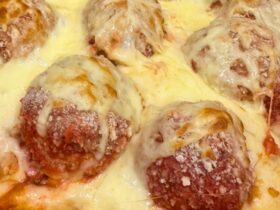 Chicken parma meatballs cooked in dish