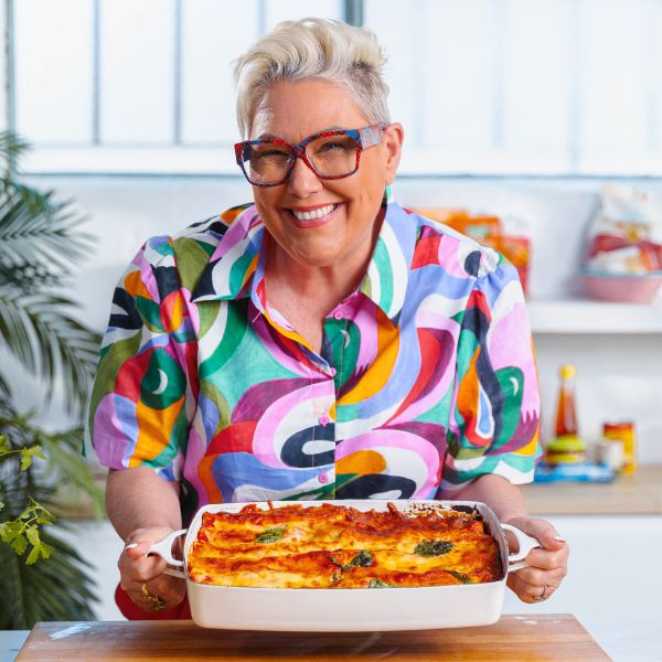 Frugal Foodie Fasta Pasta steph holding dish