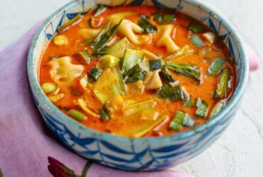 Red Thai Curry Dumpling Soup in bowl and served