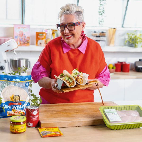 Frugal Foodie Ep 10 Steph de Sousa holding tacos