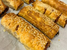 BBQ Meat Lovers Sausage Rolls cooked on tray