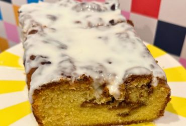 Cinnamon Roll Cake on stand