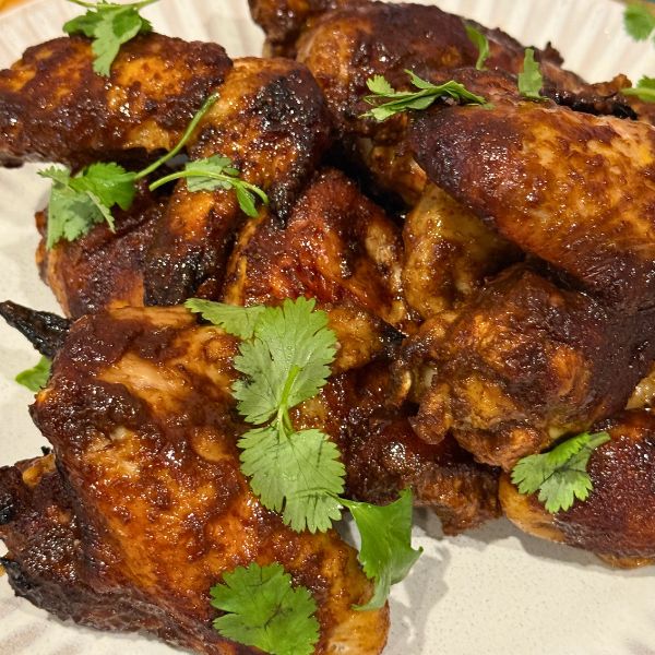 Honey BBQ Chicken Wings served Honey BBQ Chicken Wings cooked and served on plate